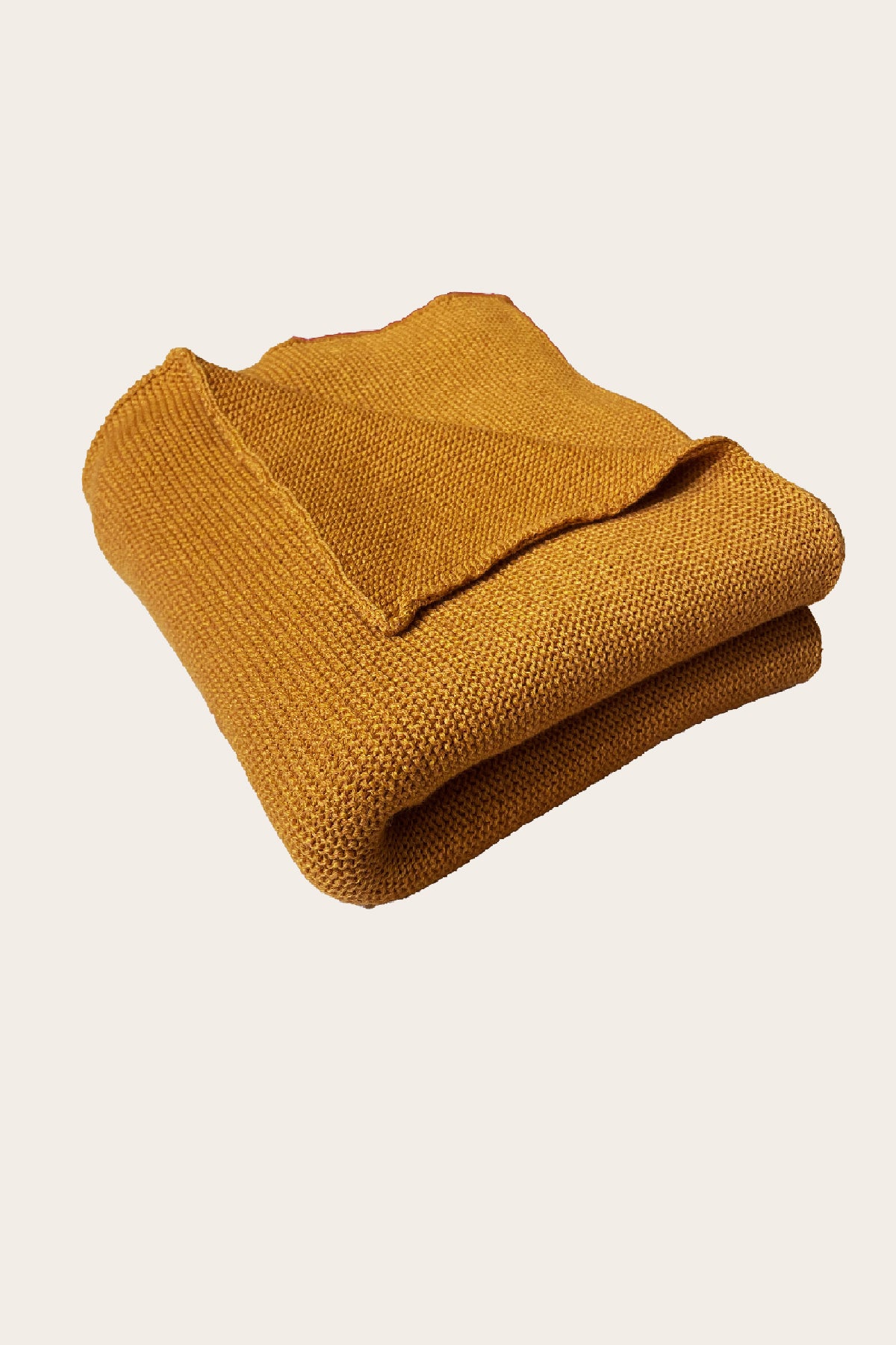 Wickeldecke Baumwolle gestrickt in warmem Senfgelb weich nachhaltig aus Bio-Material